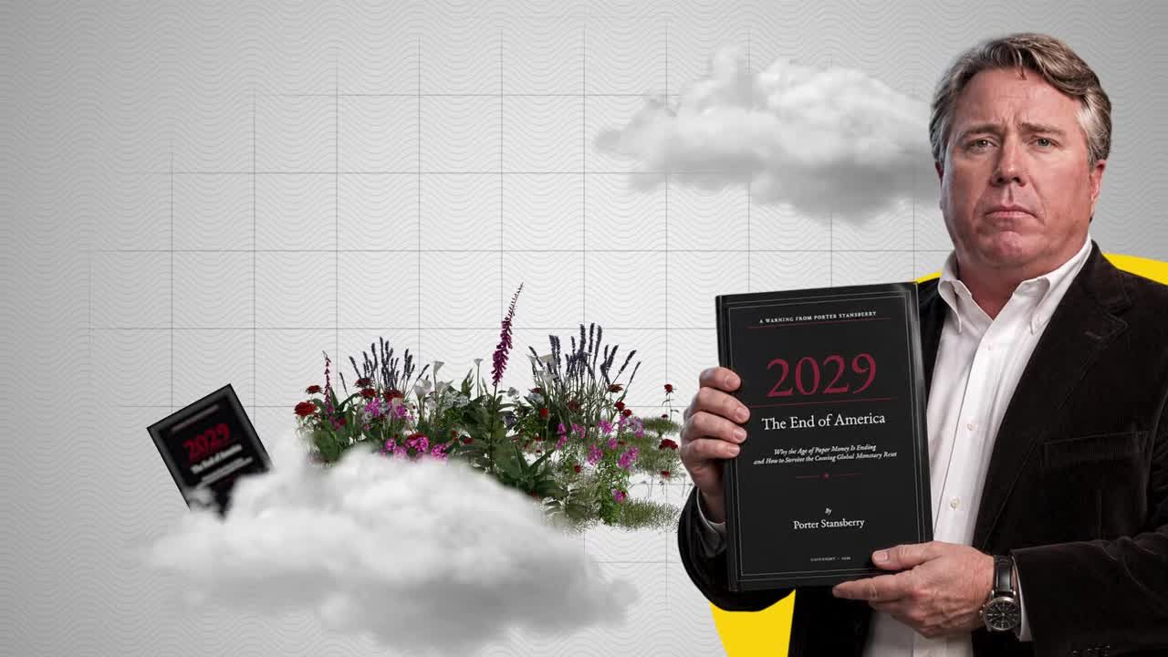 Porter Stansberry holding his book '2029: The End of America' about the coming global monetary reset